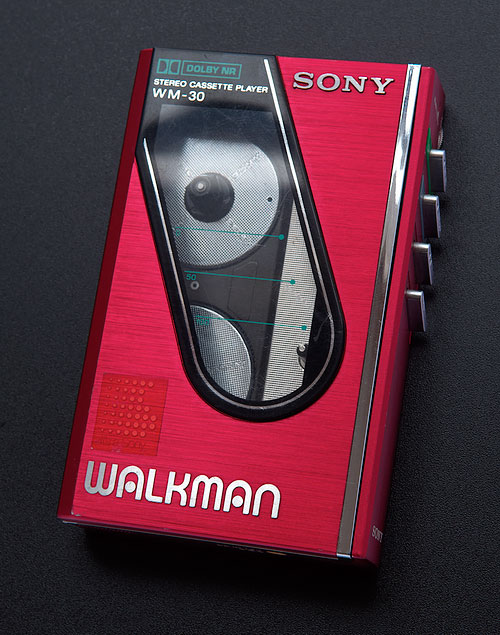 Photo of a Sony Walkman WM-30 in red.